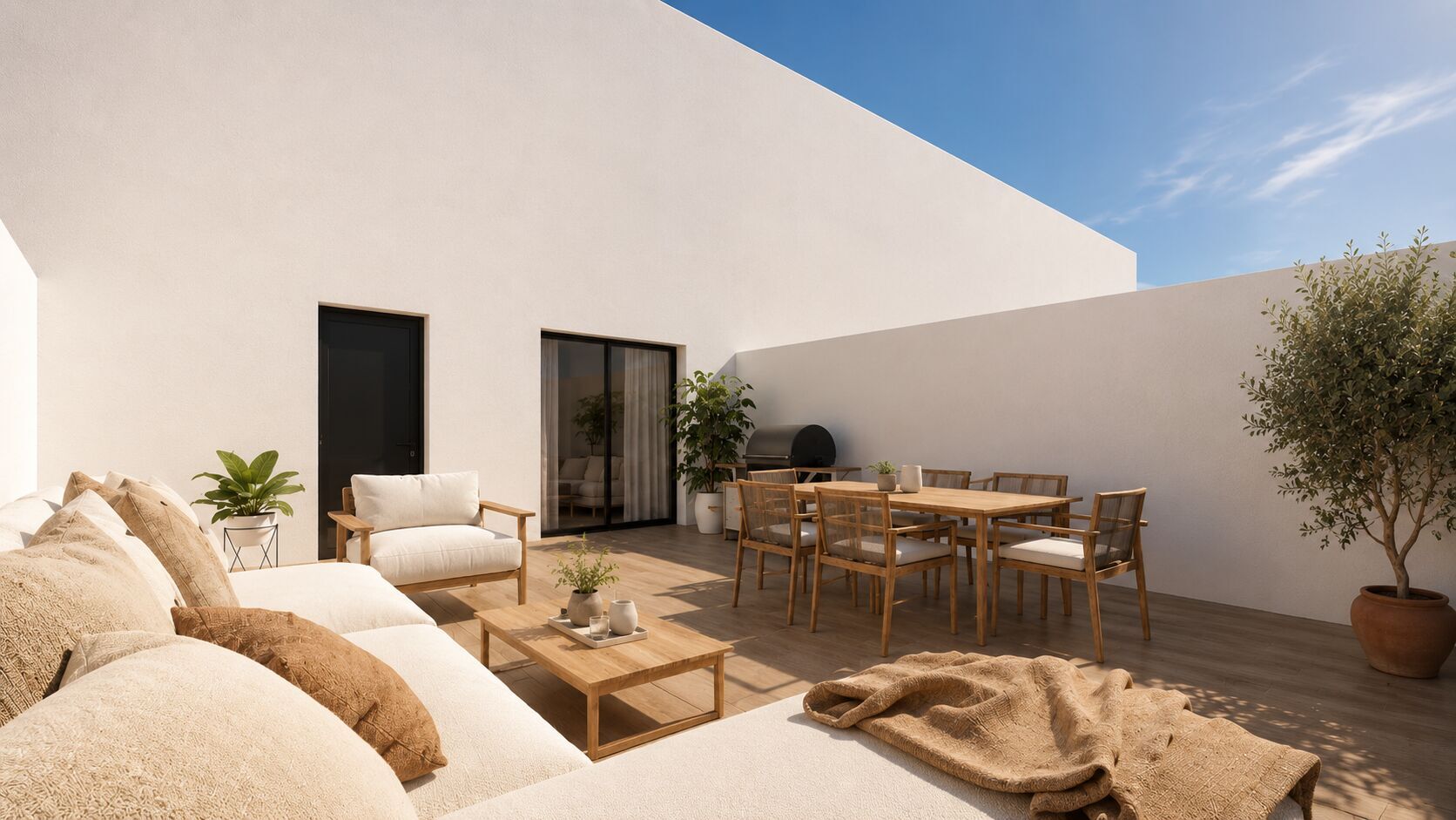 Terraza privada con zona de comedor y estar al aire libre